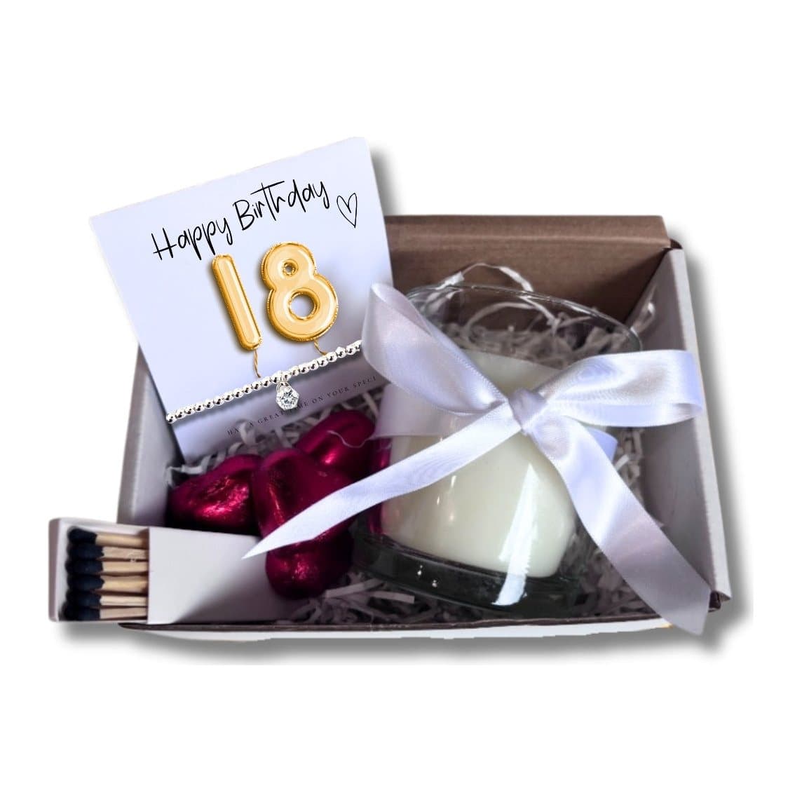 Gold balloon hamper with a silver bracelet, vanilla candle and chocolate hearts