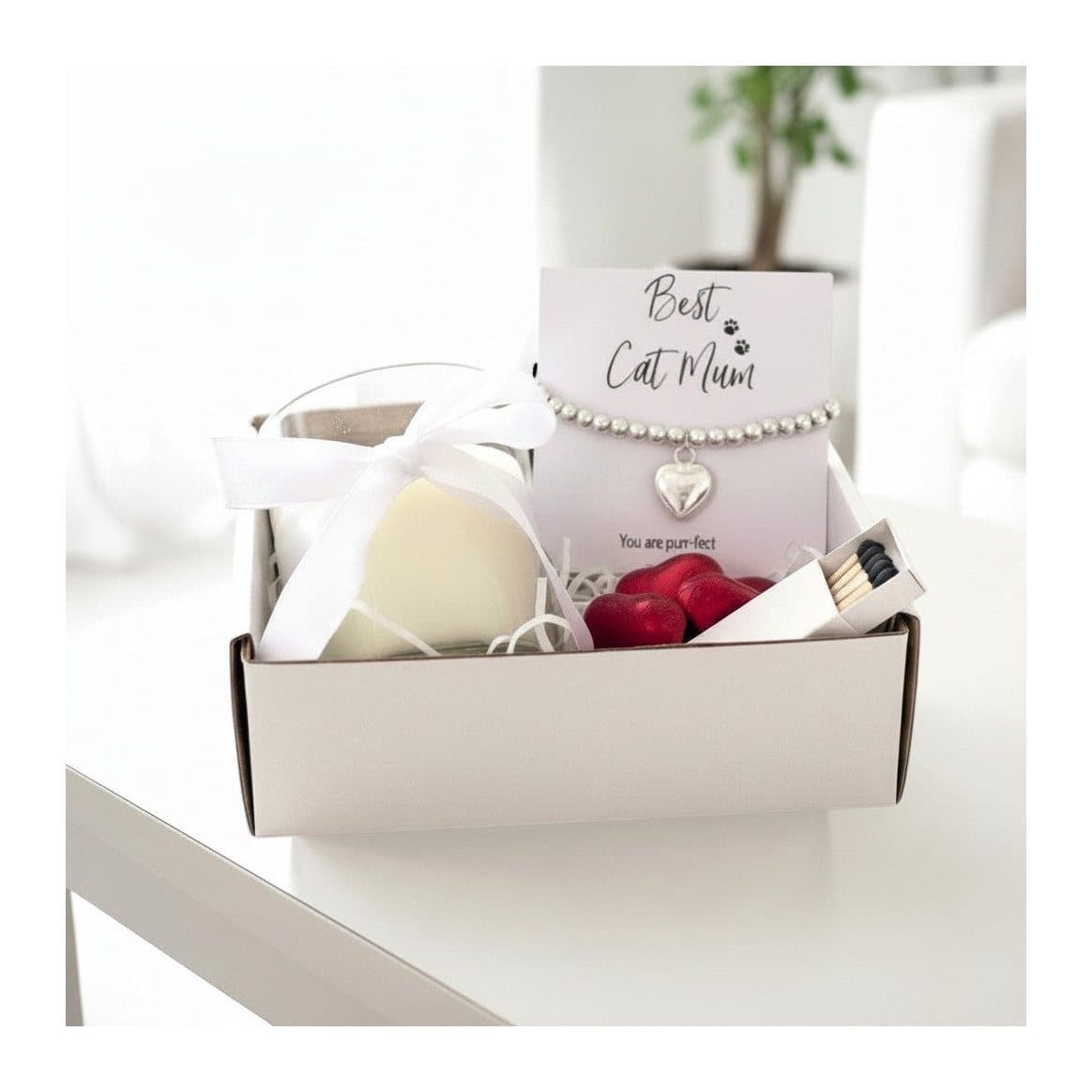 Cat mum gift hamper with a silver bracelet, candle and milk chocolate hearts