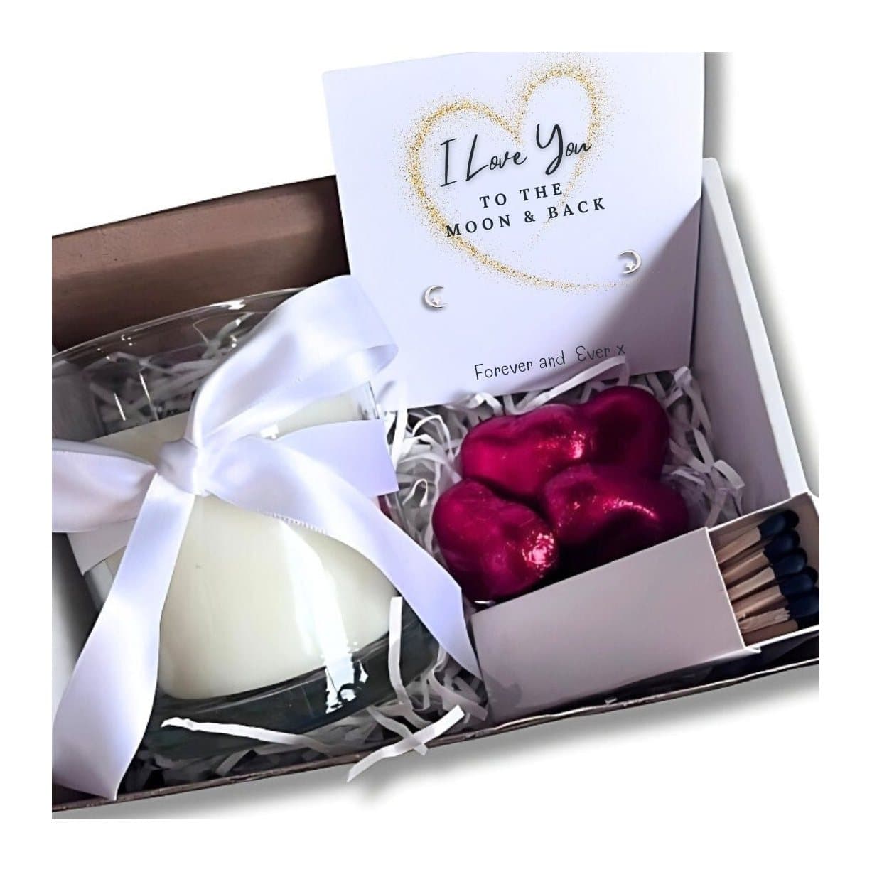 Small hamper with a vanilla candle, silver earrings and milk chocolate hearts