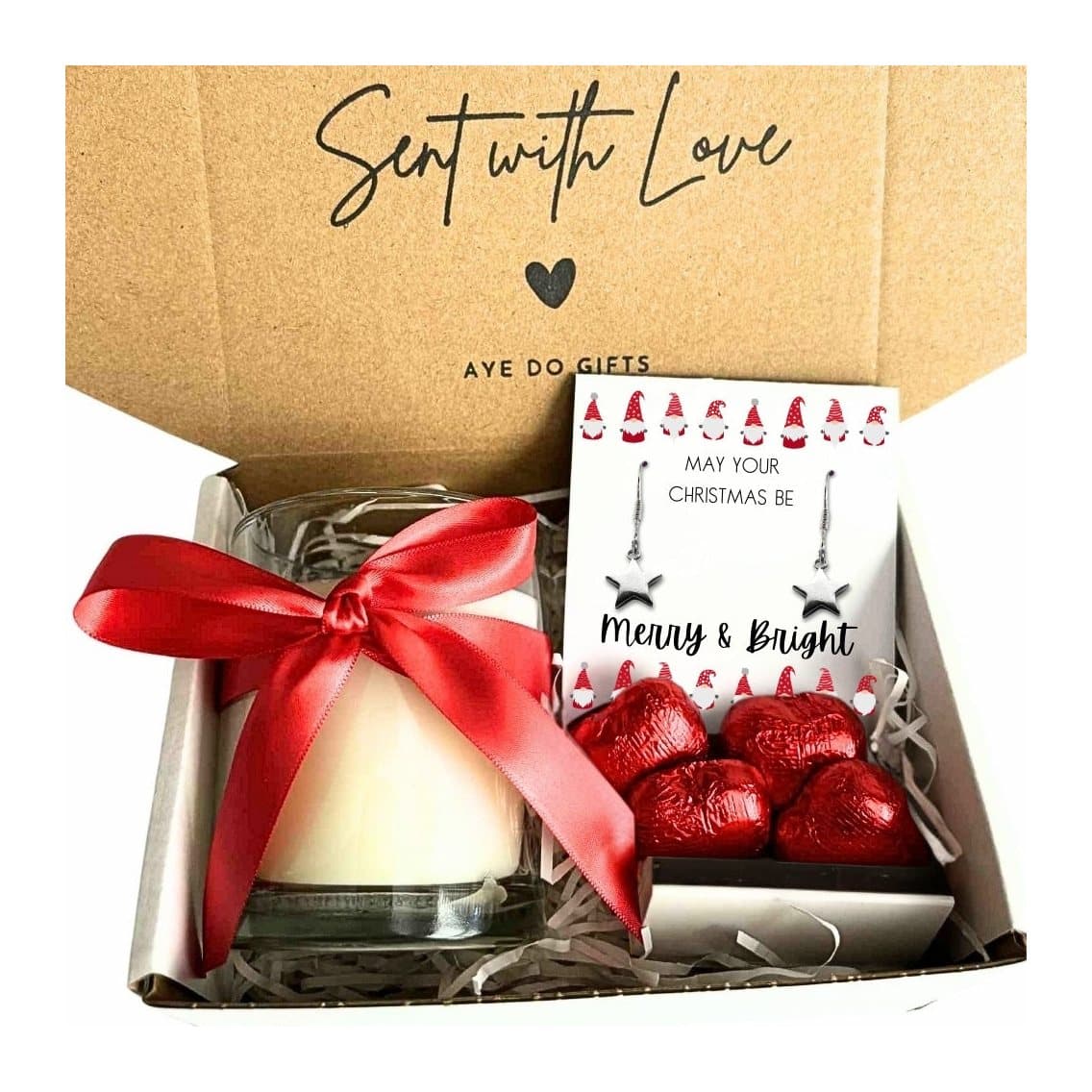 Silver star earrings, vanilla candle, red foiled chocolate hearts and message card