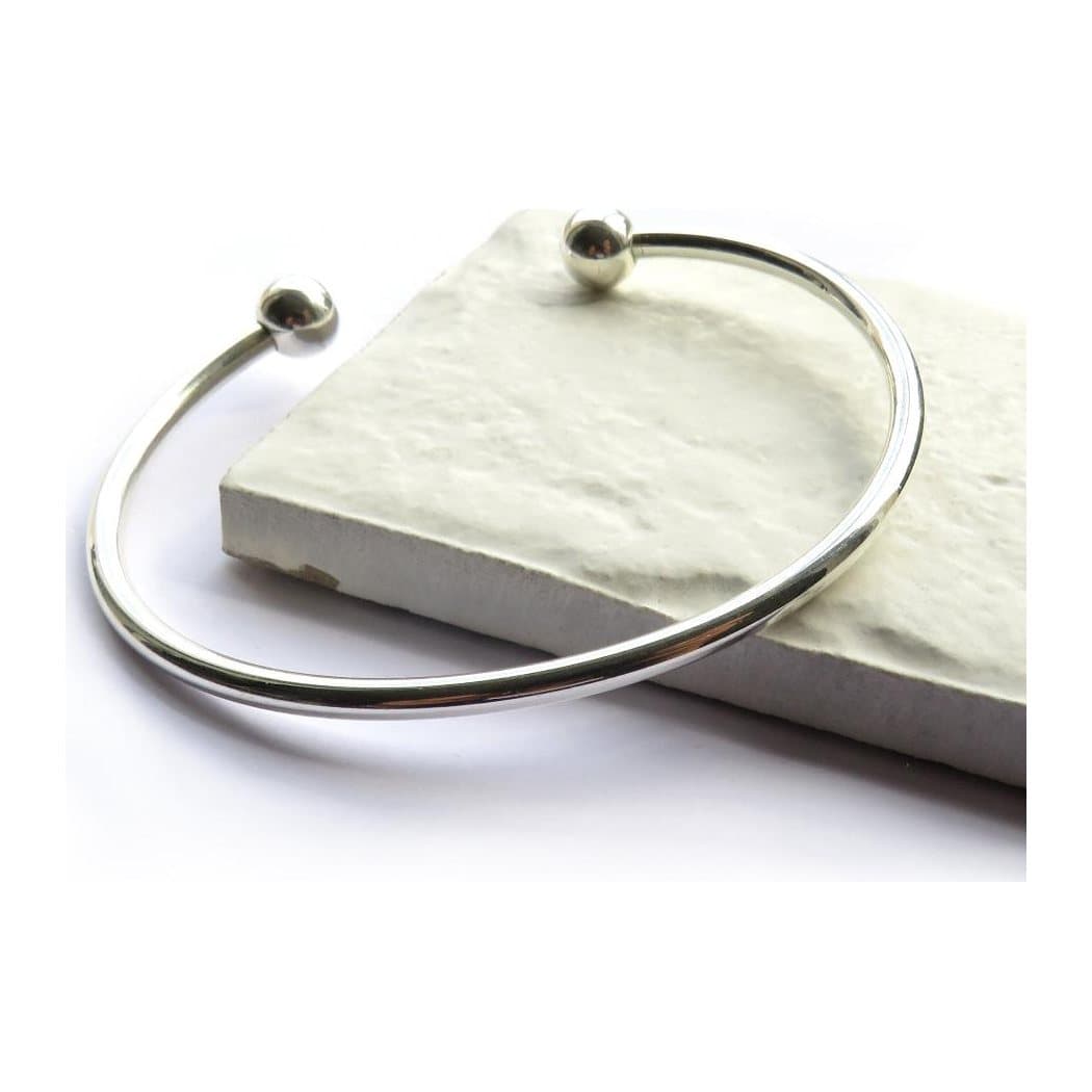 Silver torque bangle plated with sterling silver