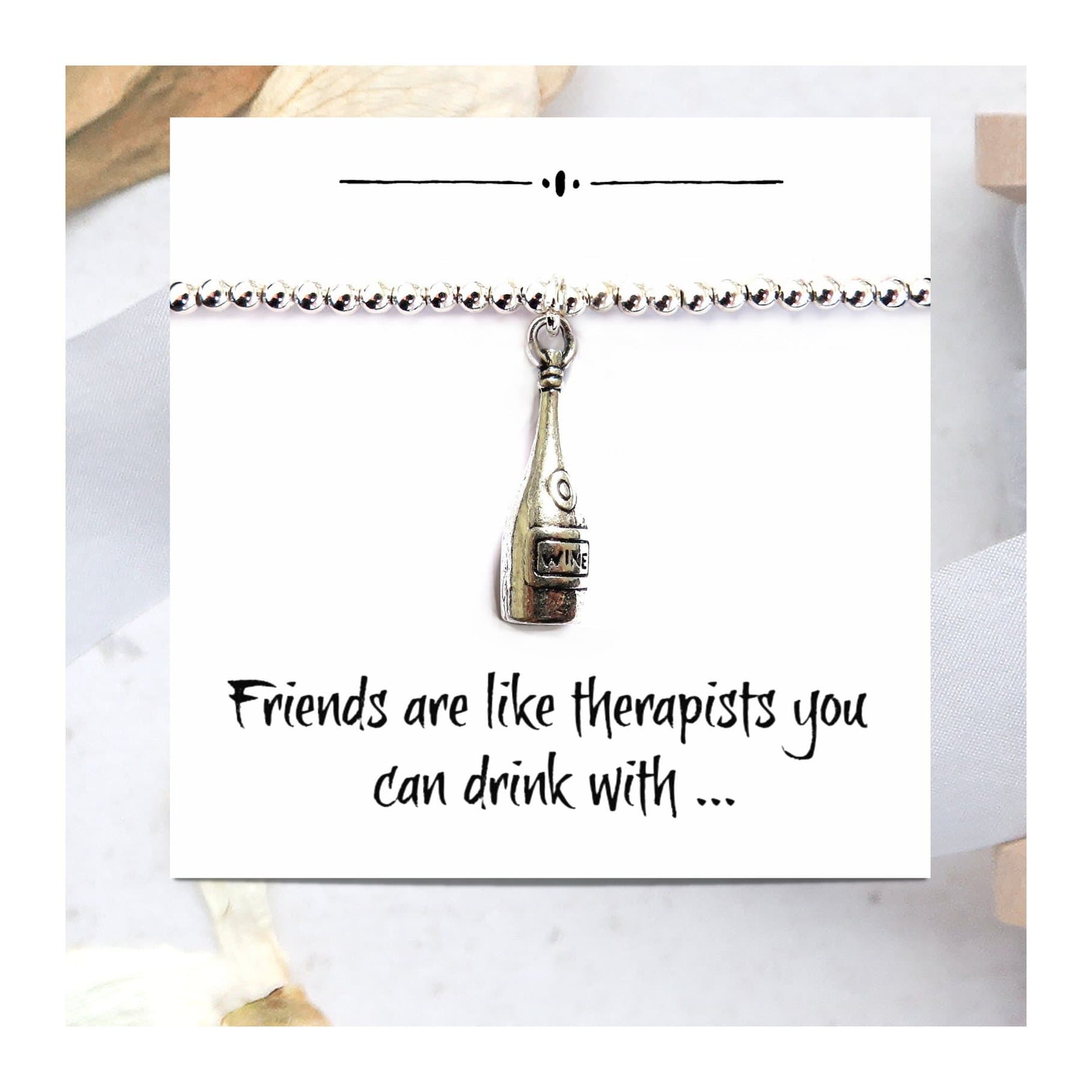 Wine bottle charm bracelet on a funny friends message card